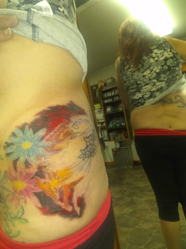 Explore hamsa tattoo ideas, creative tattoo ideas in Stetsonville, available at Solace Ink Company LLC