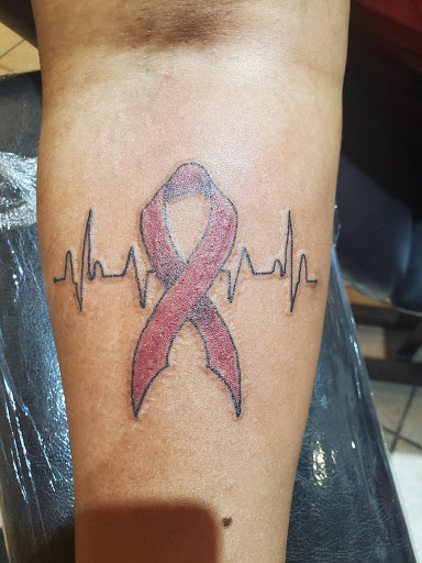 Explore playstation tattoo ideas, creative tattoo ideas in Myrtle Beach, available at Pitbull Tattoo and Piercing Clinic