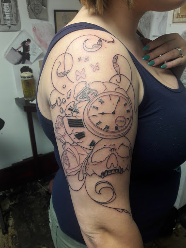 Explore rapper tattoos ideas, creative tattoo ideas in Oklahoma City, available at Skin Addiction Tattoo Studio