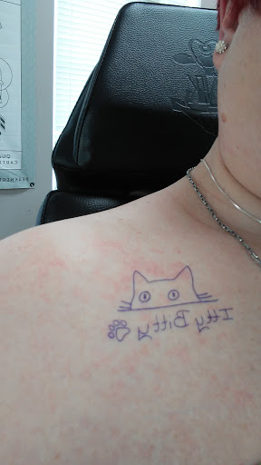 Find christmas tattoo ideas for your next unique tattoo in Kenosha at Kenosha Tattoo Company