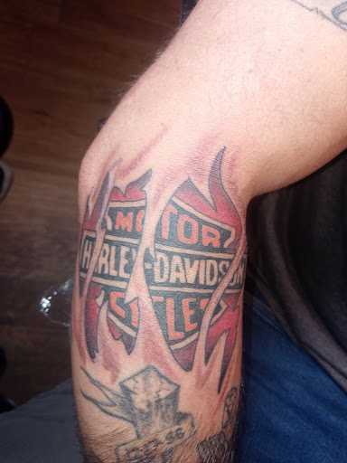 Explore black bear tattoo ideas, creative tattoo ideas in Richmond, available at Hardline tattoo