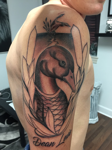 Explore umbreon tattoo ideas, creative tattoo ideas in Wake Forest, available at Revelation Ink Tattoo and Piercing