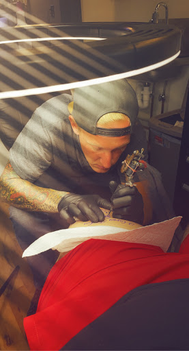 Explore men's back of neck tattoo ideas, creative tattoo ideas in Englishtown, available at Battlefront Tattoo Company