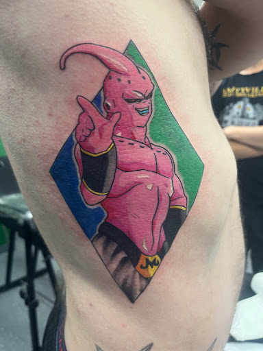 Explore back tattoo ideas male, creative tattoo ideas in La Vista, available at InkedUp Needles