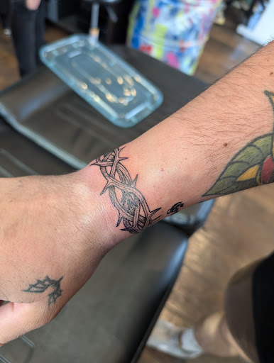 Explore pet memorial tattoo ideas, creative tattoo ideas in Fountain, available at United Tattoo