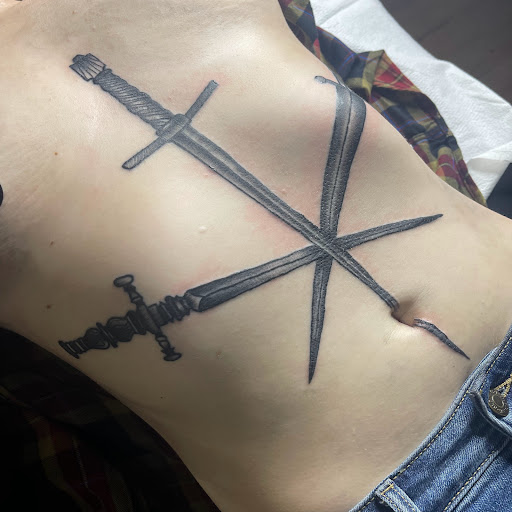 Explore bass fishing tattoo ideas, creative tattoo ideas in Buffalo, available at True Gloom Tattoo Studio