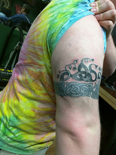 Explore neck tattoos for men ideas, creative tattoo ideas in Allentown, available at Critical Acclaim Tattoos