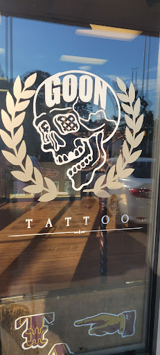 Explore red ink tattoo ideas, creative tattoo ideas in Bryant, available at Goon Tattoo