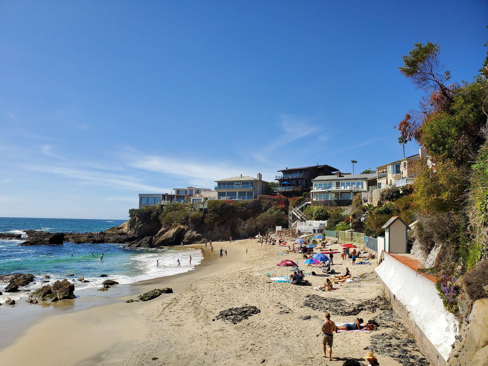 Photo of Woods Cove beach with turquoise pure water surface