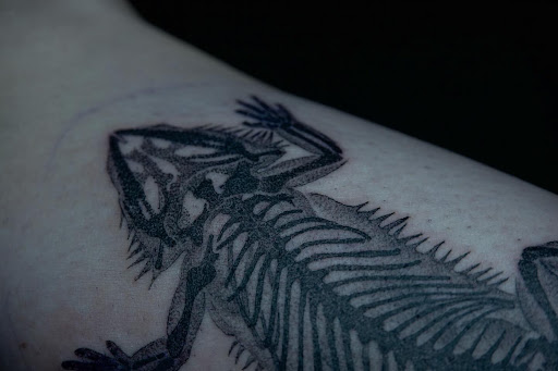 Explore religious elbow tattoo ideas, creative tattoo ideas in Pittsburgh, available at Dark Matter Tattoo Collective