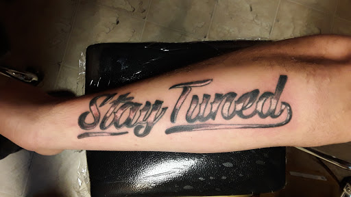 Explore rainbow baby tattoo ideas, creative tattoo ideas in Cumberland, available at Queen City Ink