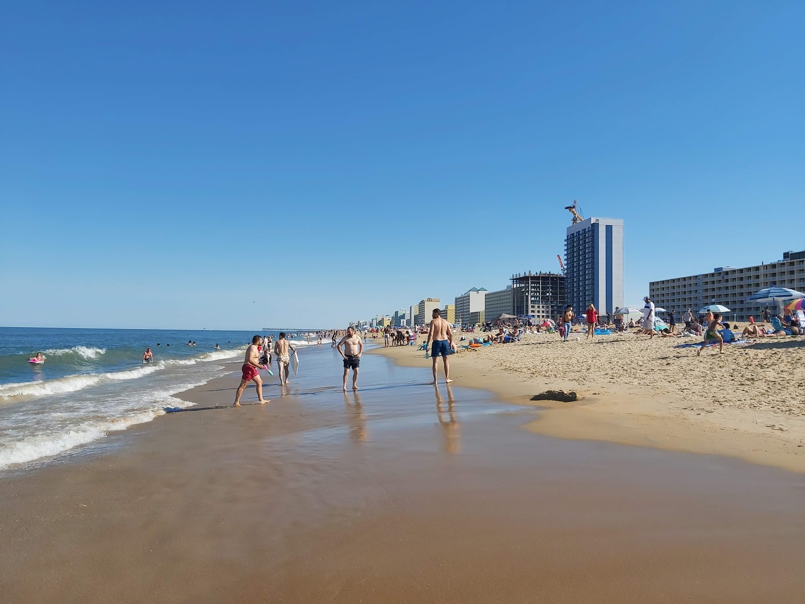 Photo of Virginia beach with bright sand surface