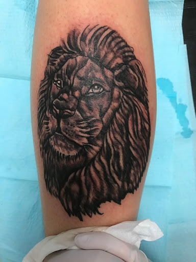 Explore love death and robots tattoo ideas, creative tattoo ideas in Seymour, available at American Gypsy Tattoo Corp.