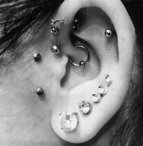 Explore cycle tattoo ideas, creative tattoo ideas in San Clemente, available at Distinctive Body Art Studio Tattoo & Piercing