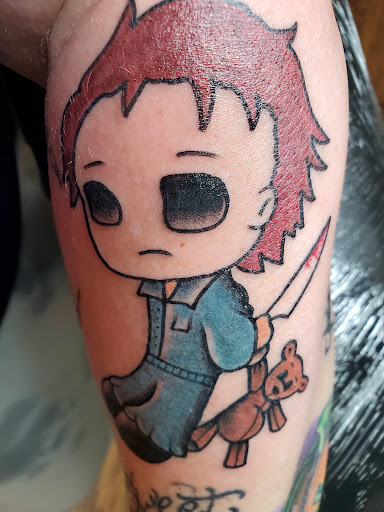 Explore chest tattoo ideas woman, creative tattoo ideas in Middletown, available at Bold Traditions Tattoo