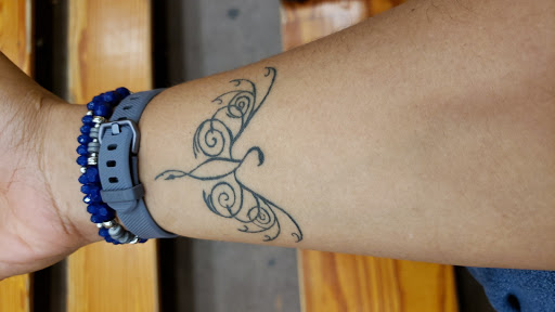 Explore tattoo ideas for women wrist, creative tattoo ideas in Huntsville, available at Black Hearts Tattoo and Body Piercing