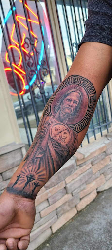 Explore blackout cover up tattoo ideas, creative tattoo ideas in Winston Salem, available at Inktellectuals Art Gallery