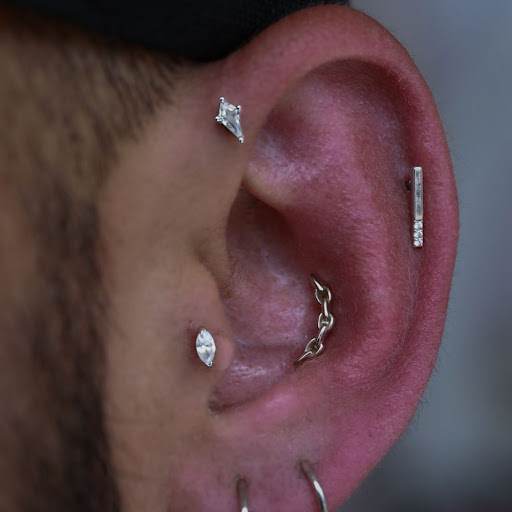 Explore tattoo ideas for dead dog, creative tattoo ideas in Corona Del Mar, available at Rainbow Piercing & Jewelry