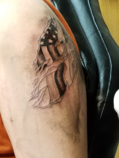 Explore greek god tattoo ideas, creative tattoo ideas in Johnstown, available at Screaming Needle Tattoo & Body Piercing