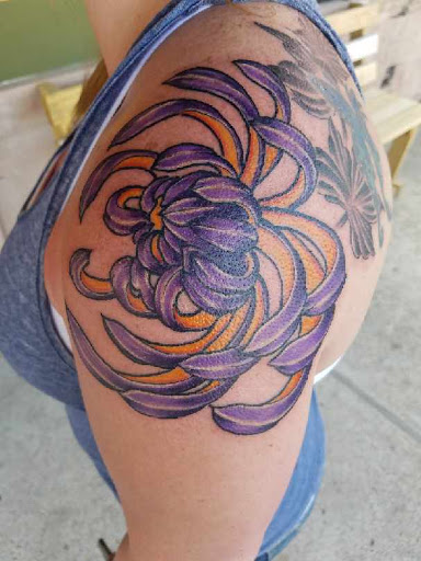 Tattoo Shop «magnum opus tattoo company», reviews and photos, 1817 Padre Blvd #4, South Padre Island, TX 78597, USA