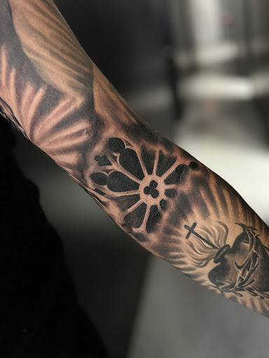 Explore tattoo space filler ideas, creative tattoo ideas in Sterling Heights, available at Roar Tattoo