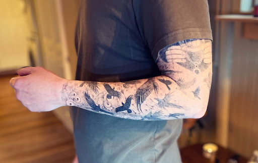 Explore small money tattoo ideas, creative tattoo ideas in Spokane, available at Ron LeMay Tattoo