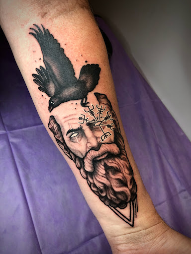 Explore hand tattoo ideas for men, creative tattoo ideas in Adrian, available at Ambition Ink