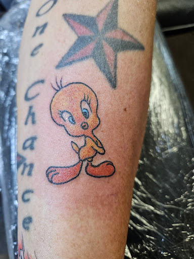 Explore struggle tattoo ideas, creative tattoo ideas in Angola, available at Hoodlum Ink