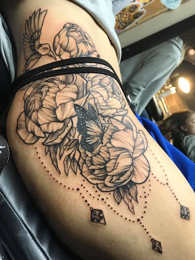 Explore name tattoo ideas on neck, creative tattoo ideas in High Point, available at 21 Aces Tattoo Co.