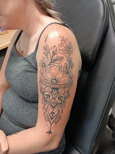 Explore tattoo ideas back of neck, creative tattoo ideas in Owosso, available at Twisted ink tattoo