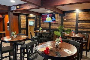 The Roasted Breadfruit Smokehouse and Grill image