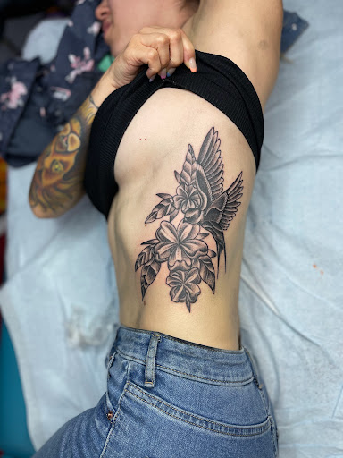 Explore apple tattoo ideas, creative tattoo ideas in Lancaster, available at Black Orchid Tattoo Collective