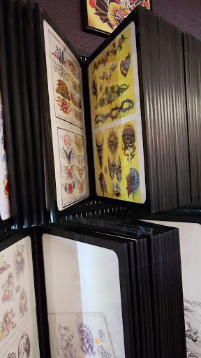 Explore women tattoos ideas, creative tattoo ideas in Hazard, available at Electric Chair Tattoo
