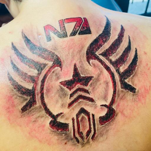 Explore automotive tattoo sleeve ideas, creative tattoo ideas in Brunswick, available at Brunswick Tattoo Company