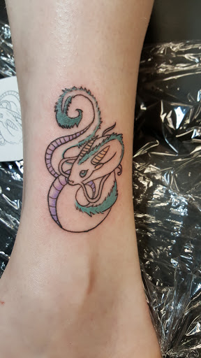 Explore manatee tattoo ideas, creative tattoo ideas in Concord, available at Silver Needle Studios