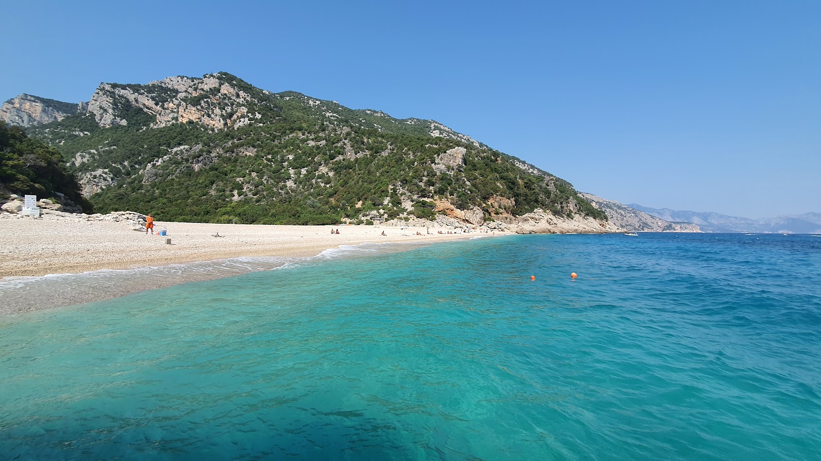 Photo of Cala Sisine backed by cliffs