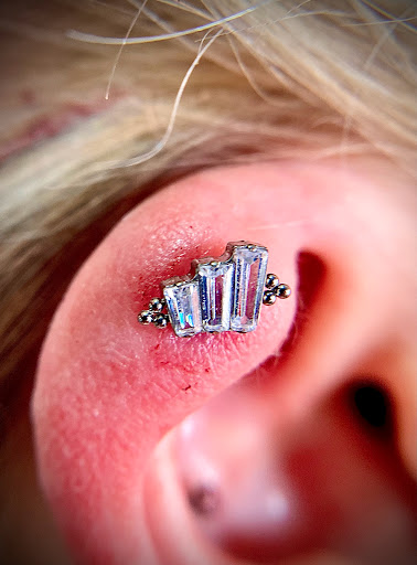 Explore christian tattoo idea, creative tattoo ideas in Orange, available at Symbiosis Body Piercing