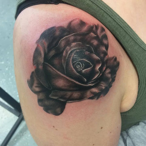 Explore dark knight tattoo ideas, creative tattoo ideas in Chapel Hill, available at Golden Falcon Tattoo and Piercing