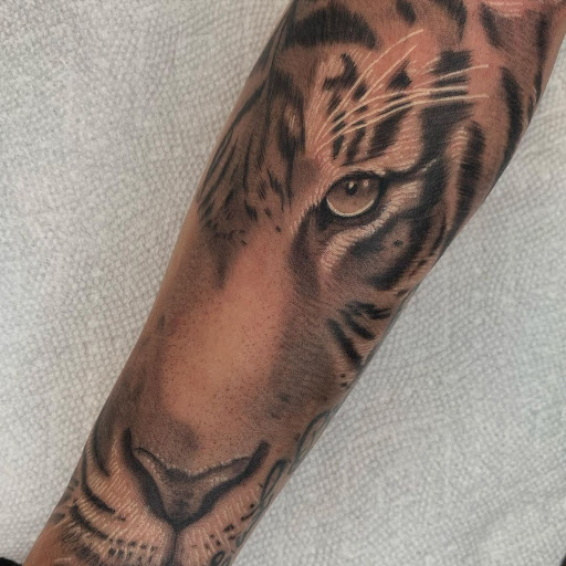 Explore mens wrist tattoo ideas, creative tattoo ideas in Buffalo, available at True Gloom Tattoo Studio