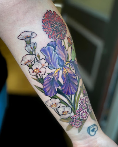 Explore mountain bike tattoo ideas, creative tattoo ideas in Bellefonte, available at Juniper Studio
