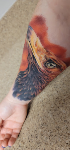 Explore crystal ball tattoo ideas, creative tattoo ideas in Lake Villa, available at Eternal Tiger Tattoo