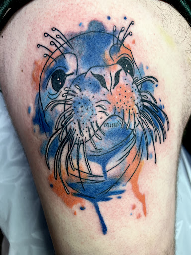 Explore skier tattoo ideas, creative tattoo ideas in Adrian, available at Good Life Tattoo Co.