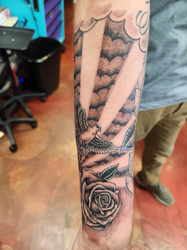 Explore small arm tattoo ideas for guys, creative tattoo ideas in Inverness, available at The Perfect Spot Tattoos