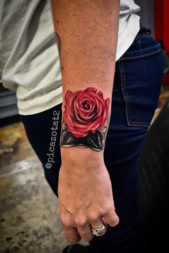 Explore little hand tattoo ideas, creative tattoo ideas in Palm Desert, available at Picazo Tattoo Studio