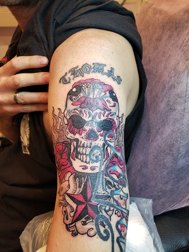 Explore roman numeral tattoo ideas for females, creative tattoo ideas in Davis, available at SIX GUN SOUND TATTOO