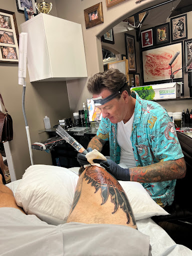 Explore grinch tattoo ideas, creative tattoo ideas in San Diego, available at Guru Tattoo