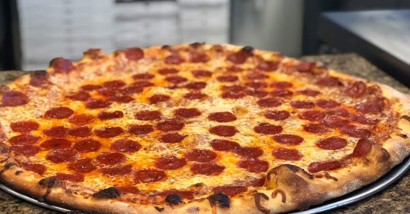 #9 best pizza place in Erie - Sticks & Bricks Wood Fired Pizza