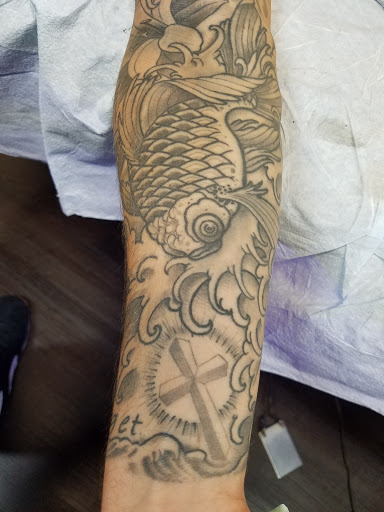 Explore graffiti tattoo ideas, creative tattoo ideas in Charleston, available at Broken Lantern Tattoo