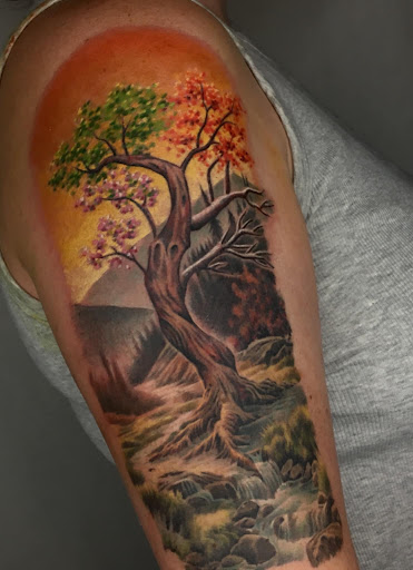 Explore tattoo sleeve ideas with trees, creative tattoo ideas in Lakeview, available at Backwoods Tattoo Studio