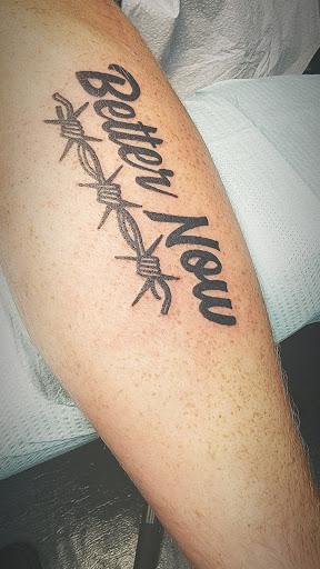 Explore small behind ear tattoo ideas, creative tattoo ideas in Fort Myers, available at HOWL Tattoo & Piercing